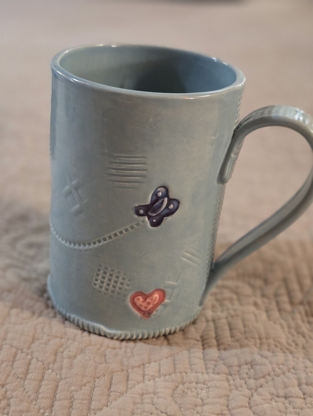 Handcrafted Light Green Ceramic Mug with Heart & Butterfly Accent